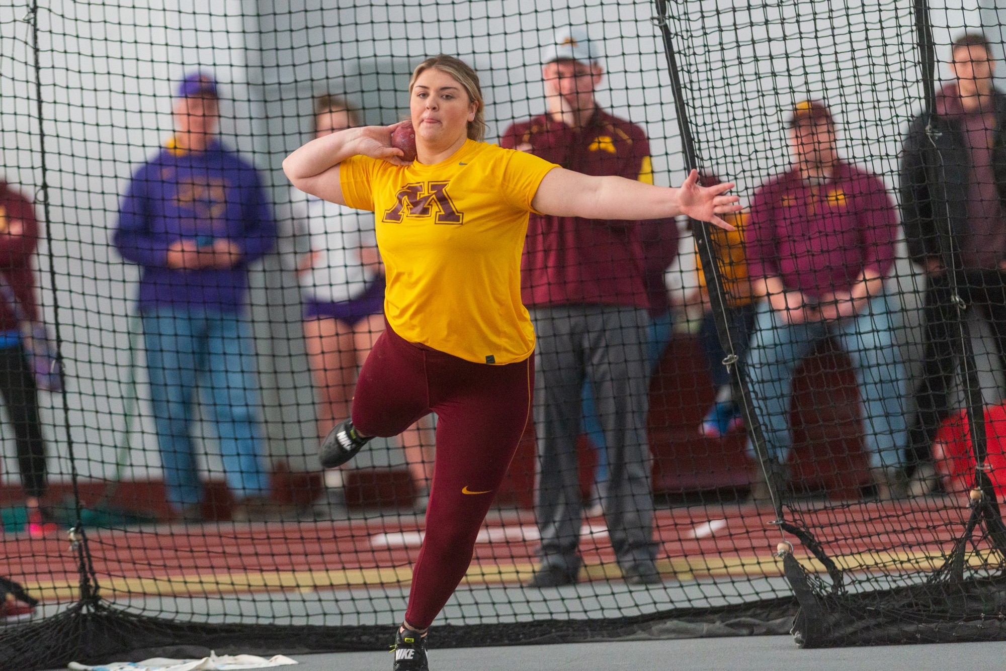 Gophers Redshirt Senior Shay Nielsen warms up to compete in the Minnesota Cold Classic at the University of Minnesota Fieldhouse on Friday, Feb. 21.