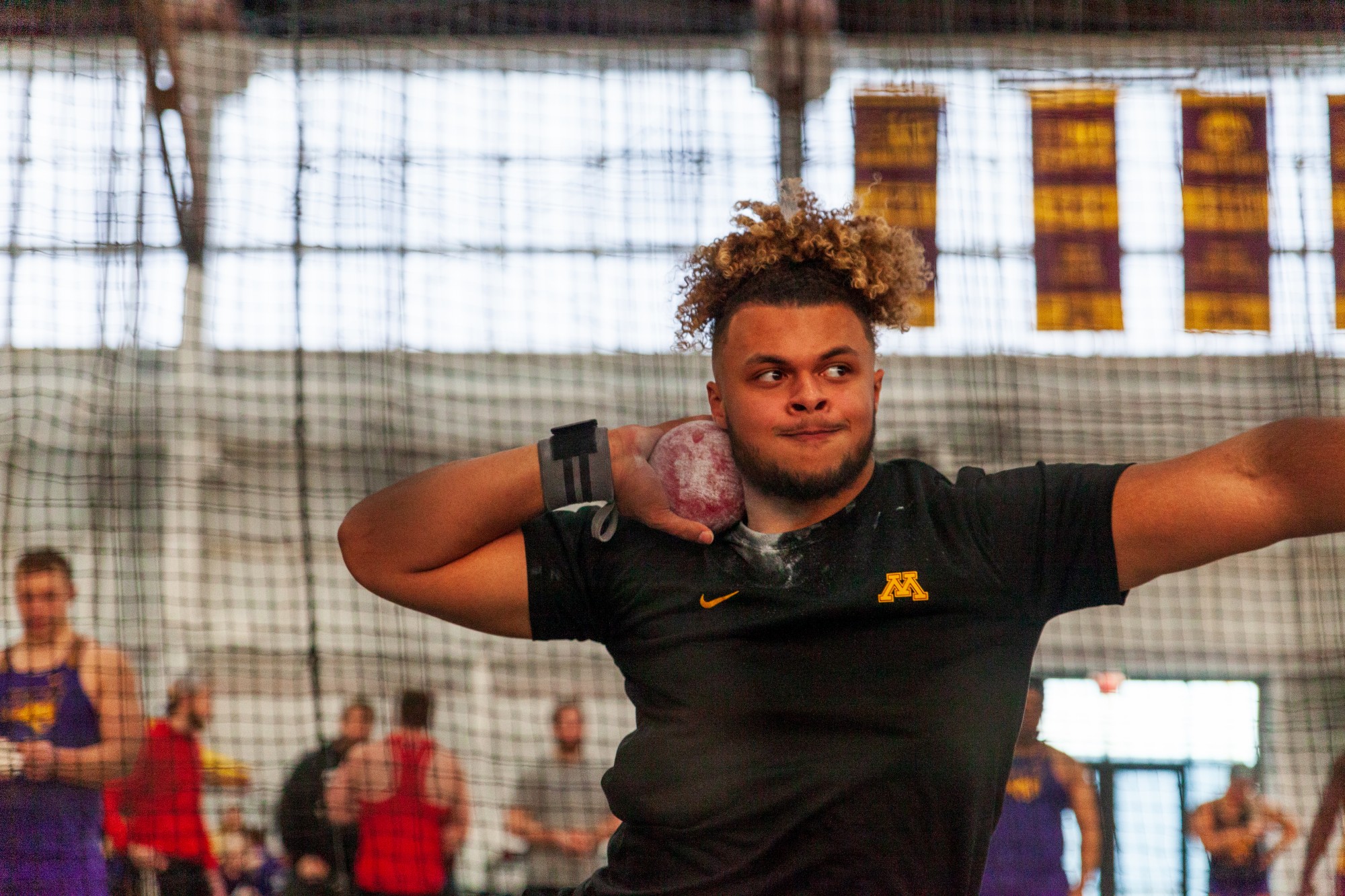 Gophers Freshman Kyle Atkinson competes unattached in the shot put at the Minnesota Cold Classic at the University of Minnesota Fieldhouse on Friday, Feb. 21.