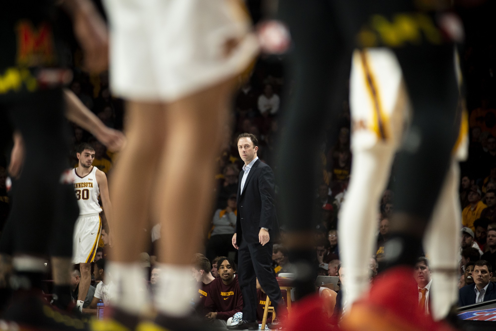 Head Coach Richard Pitino looks towards his team from the sidelines during a free throw attempt. The Gophers finished the half with a 47-31 lead over the Maryland Terrapins at Williams Arena on Weds, Feb. 26. (Parker Johnson / Minnesota Daily)