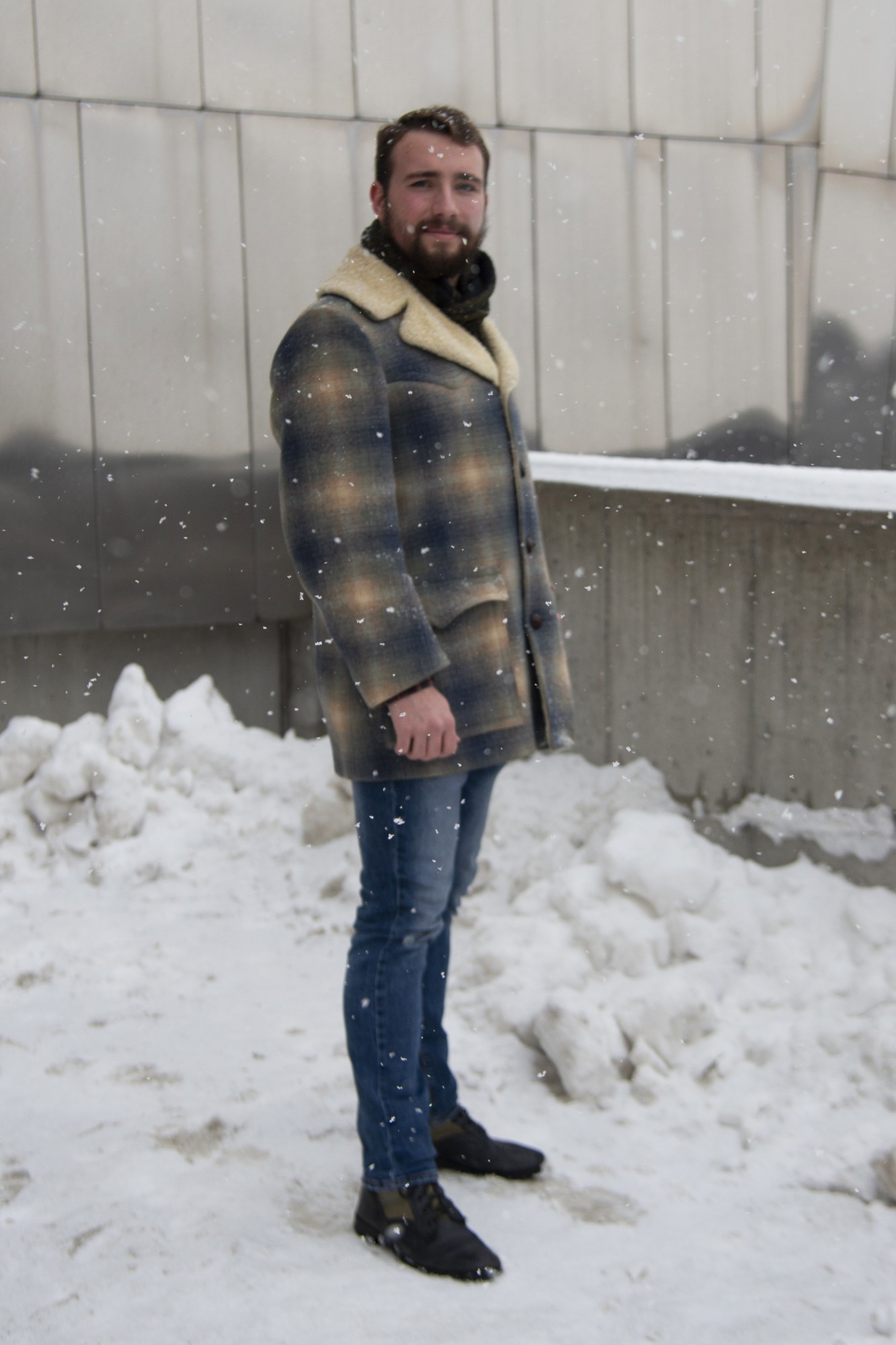 Alekzander Timmerman, freshman, poses for a portrait on the Washington Avenue Bridge on Friday, Jan. 31. 