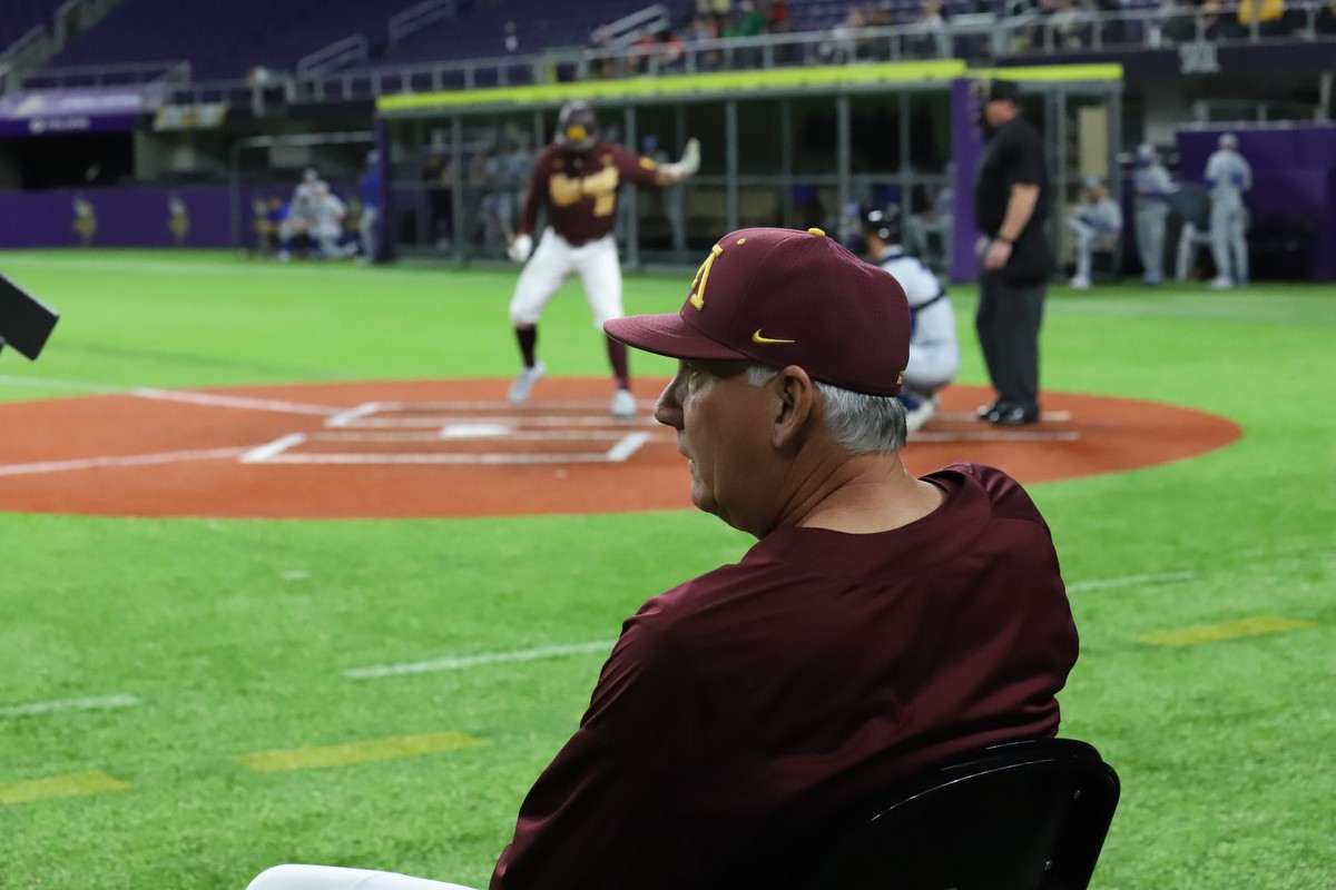 Gophers Head Coach John Anderson observes the game and provides feedback to players at U.S Bank Stadium on Saturday, Feb. 29. The Gophers fell to Duke 3-7.