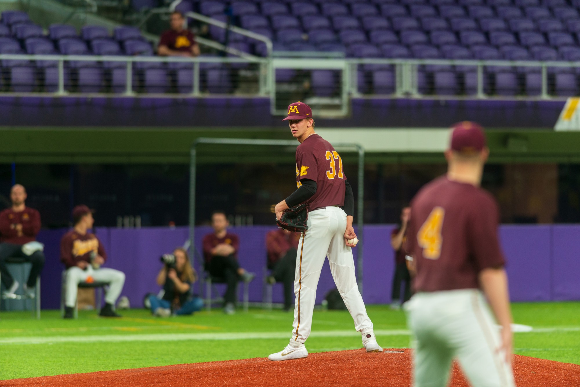 Gophers Pitcher Trent Schoeberl scans the field at U.S. Bank Stadium on Tuesday, March 3.