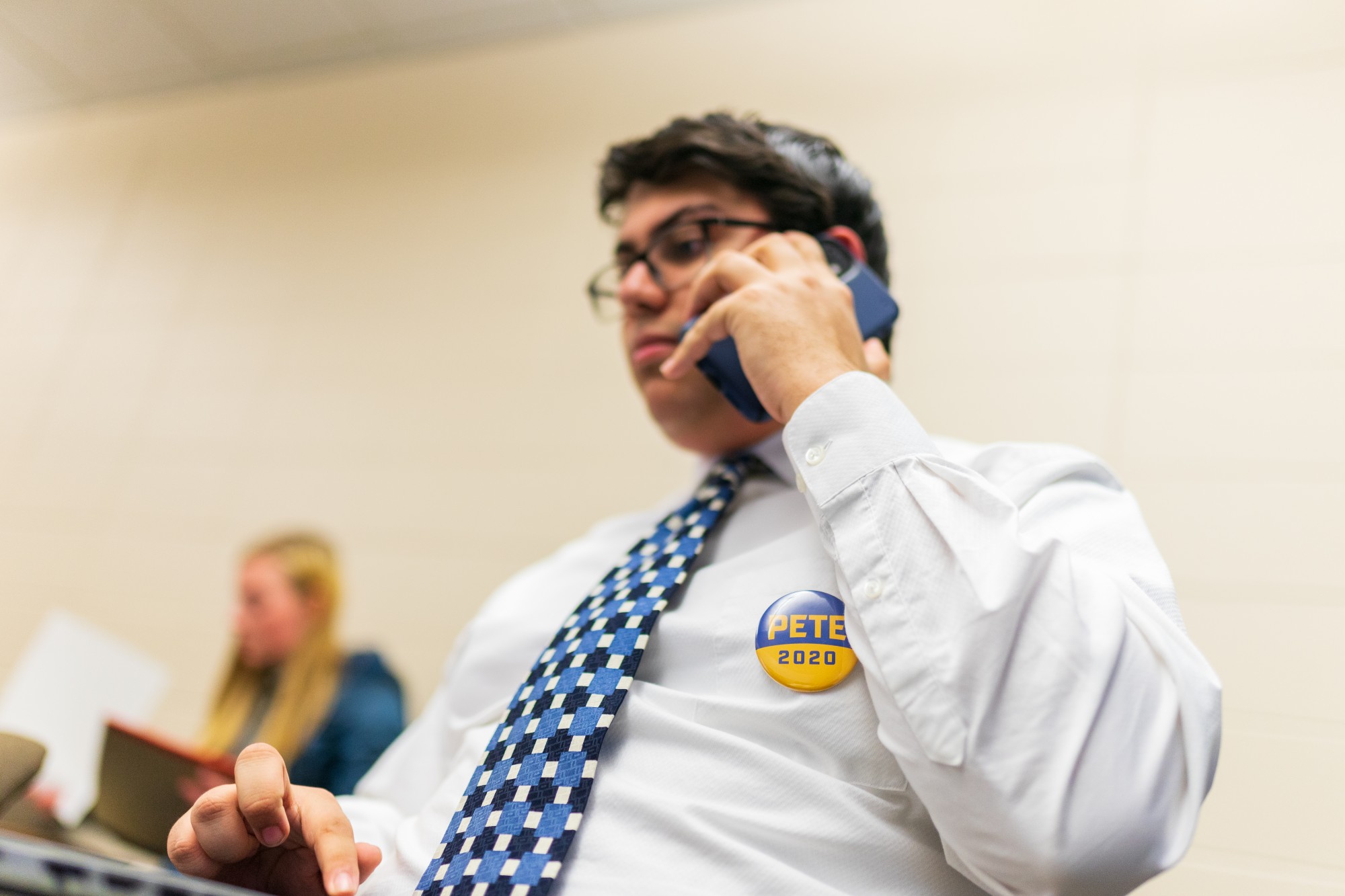Phone bank organizer Jack Sewpersaud makes a call hoping to discuss the upcoming Super Tuesday primary and garner support for Democratic presidential candidate Pete Buttigieg at a phone banking effort in Blegen Hall on Friday, Feb. 28.