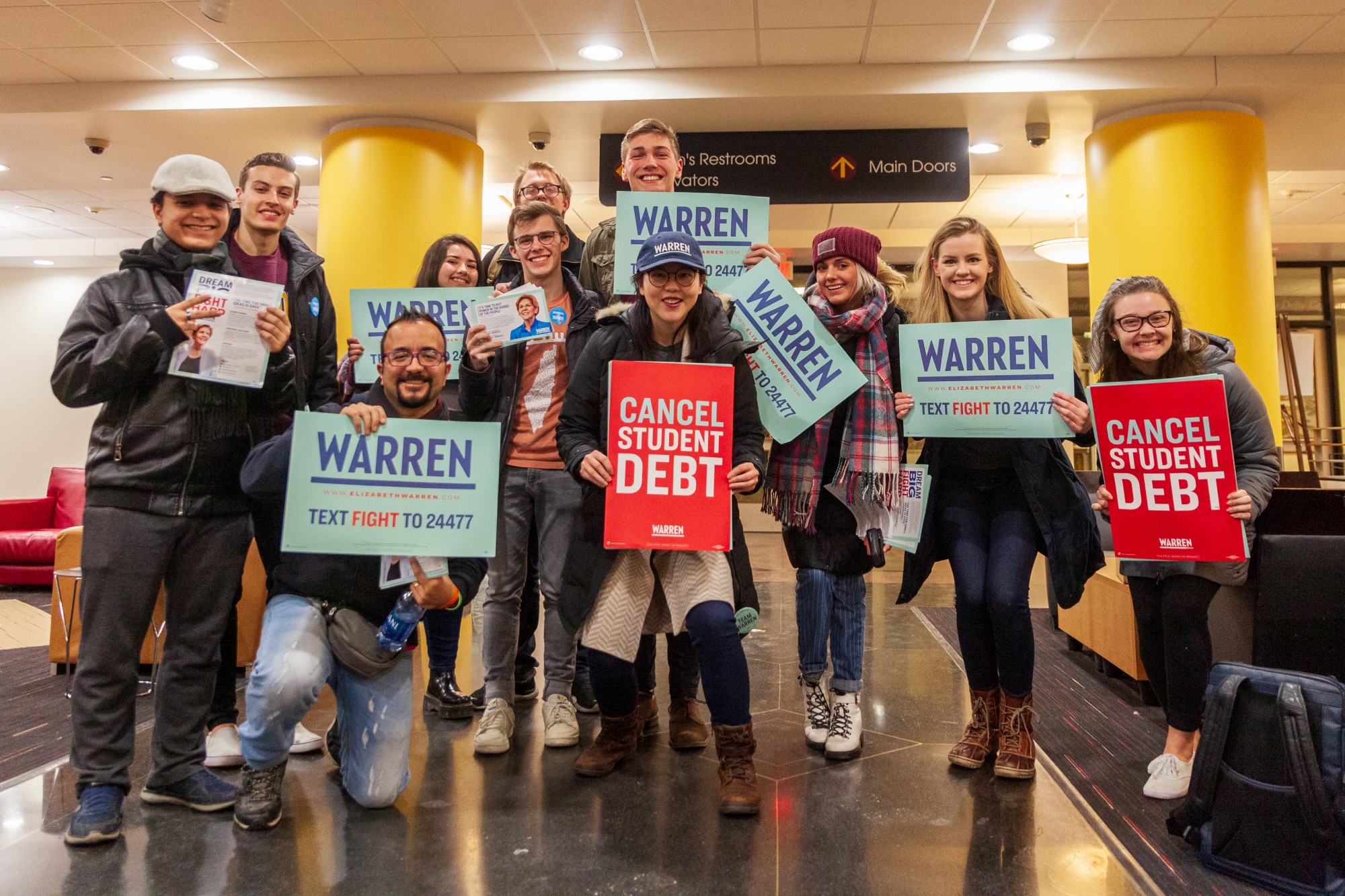 Student supporters of Democratic presidential candidate Sen. Elizabeth Warren gather in the Coffman Union on Monday, March 2, to chalk and poster areas of the campus before Super Tuesday.