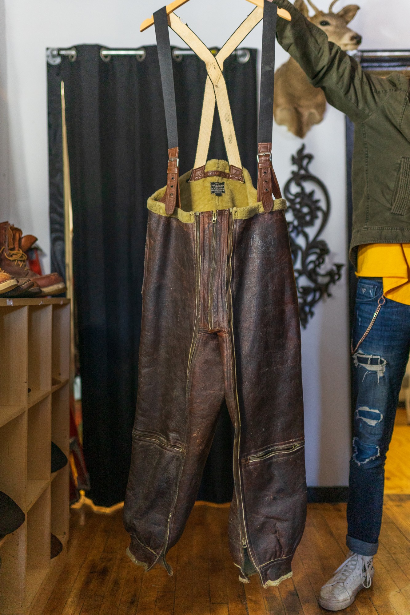 A pair of WWII Sheepskin flight pants, worn by U.S. Army Airforce pilots to combat extreme temperatures at altitude, at The Cat and The Cobra thrift and consignment store on Friday, Feb 29.