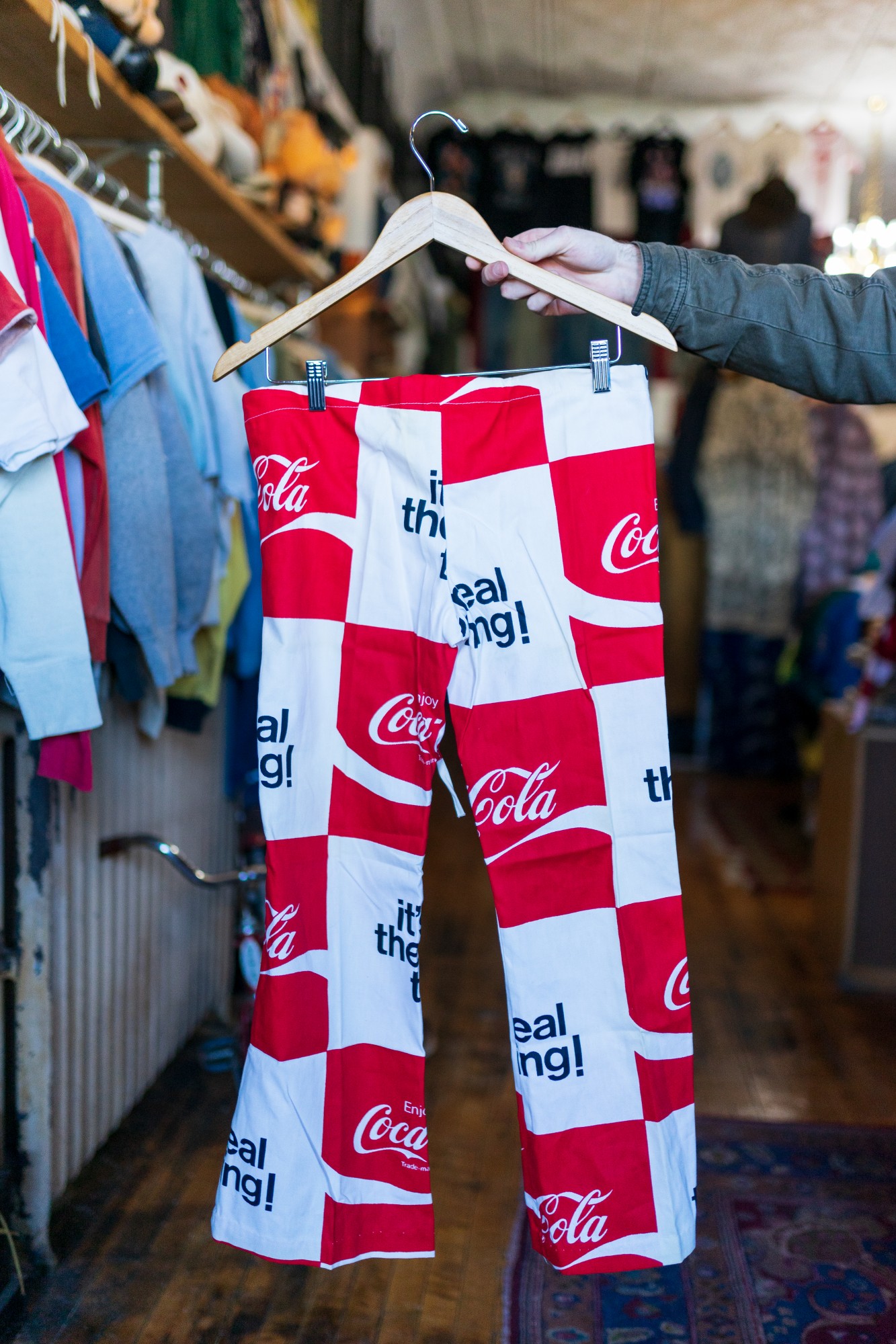 A pair of pants, sold in the 1970s as part of the Coca-Cola Companys “It’s the Real Thing” campaign, at The Cat and The Cobra thrift and consignment store on Friday, Feb 29.