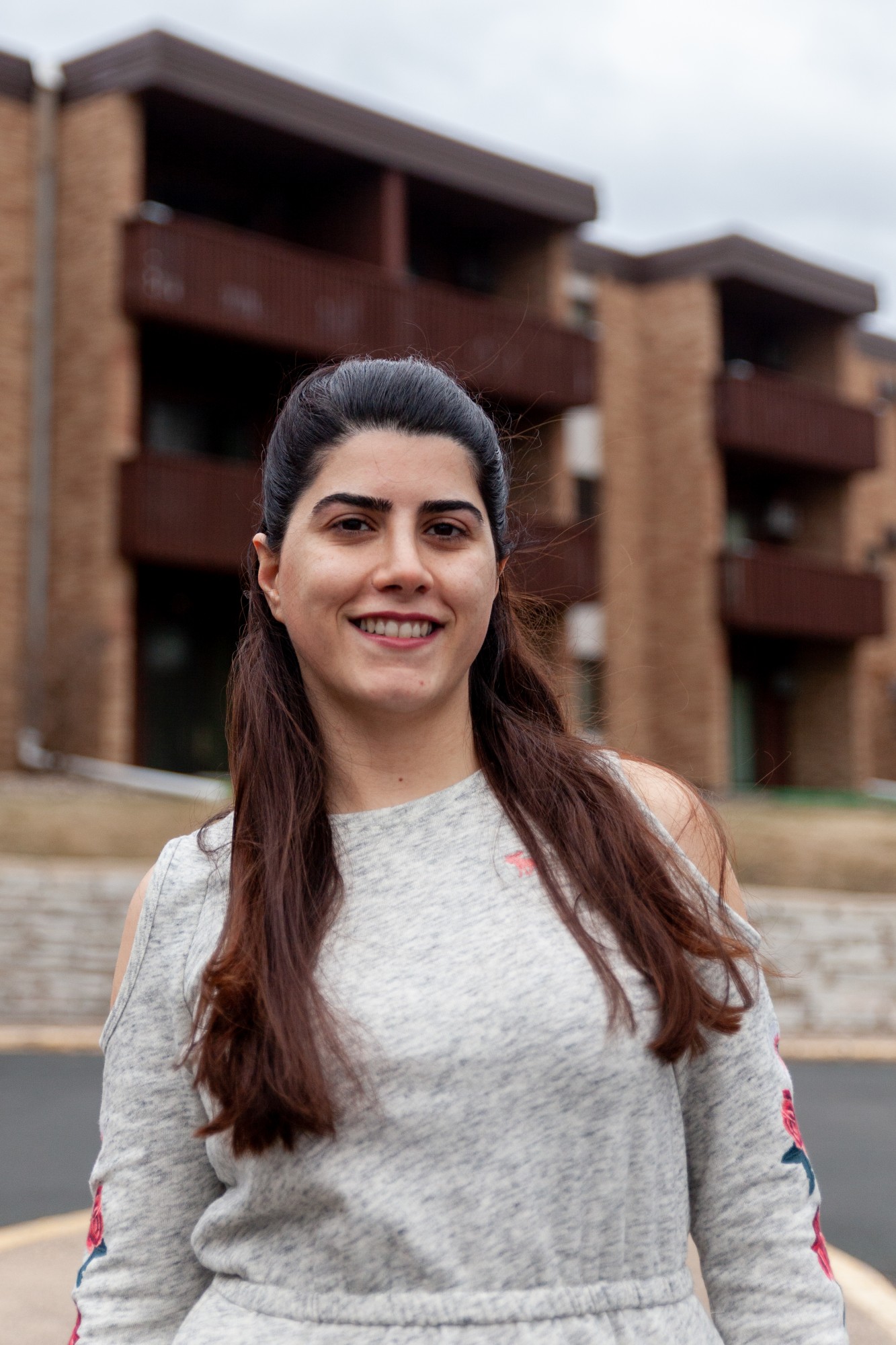 Senior Maryam Zahedi poses for a portrait at her apartment in Roseville on Saturday, March 21. The Persian New Year, traditionally celebrated with gatherings of friends and family, has been greatly impacted by restrictions on human interaction implemented in response to COVID-19.