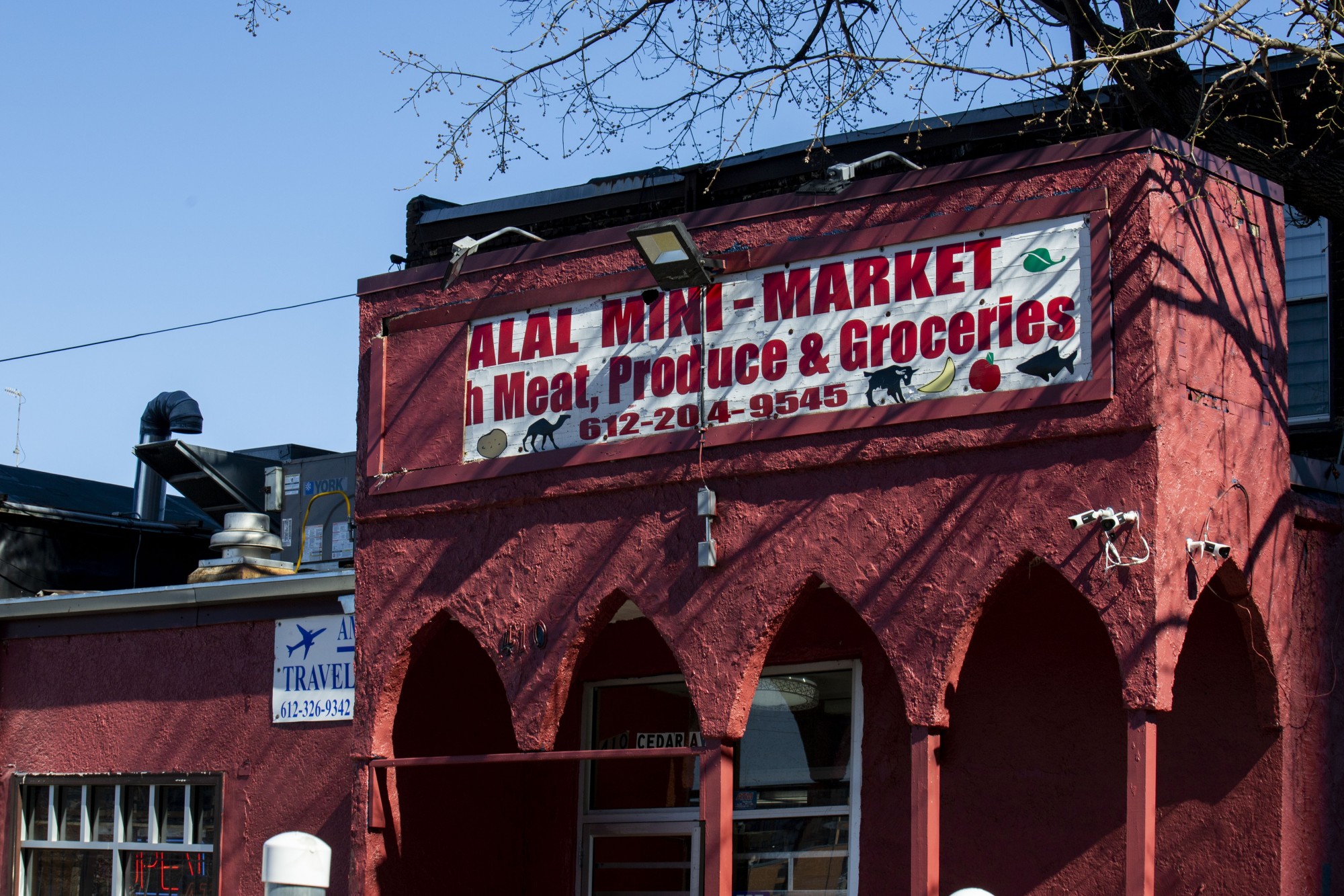 Halal Mini Market, one local business that is limiting the number of customers that come into the store at a time, is seen on West Bank on Monday, March 31. 