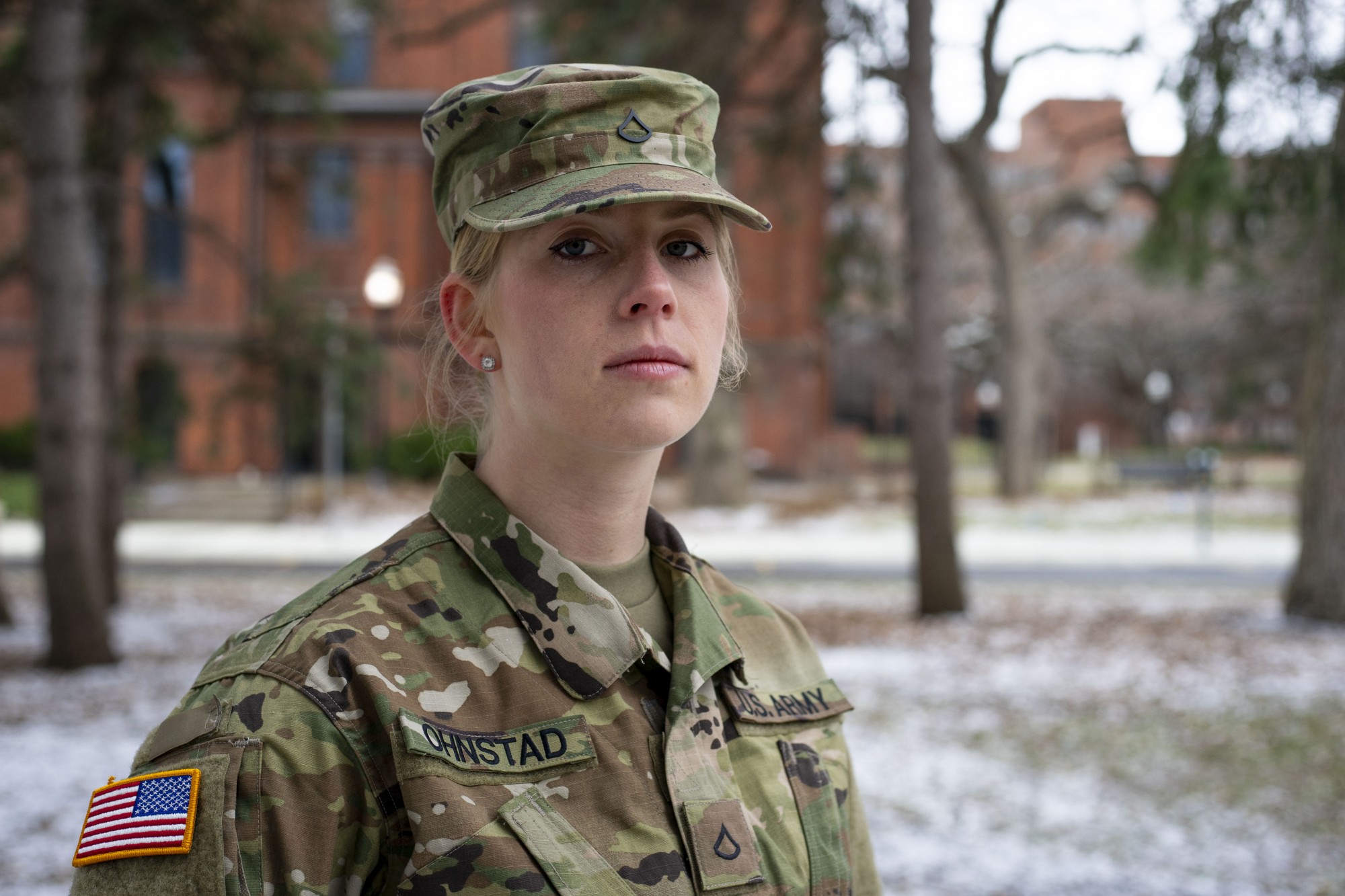 Senior Violet Ohnstad poses for a portrait on campus on Friday, April 3. Ohnstad, who enlisted in the National Guard in January, is uncertain what the next few months will look like as she prepares for basic training. 