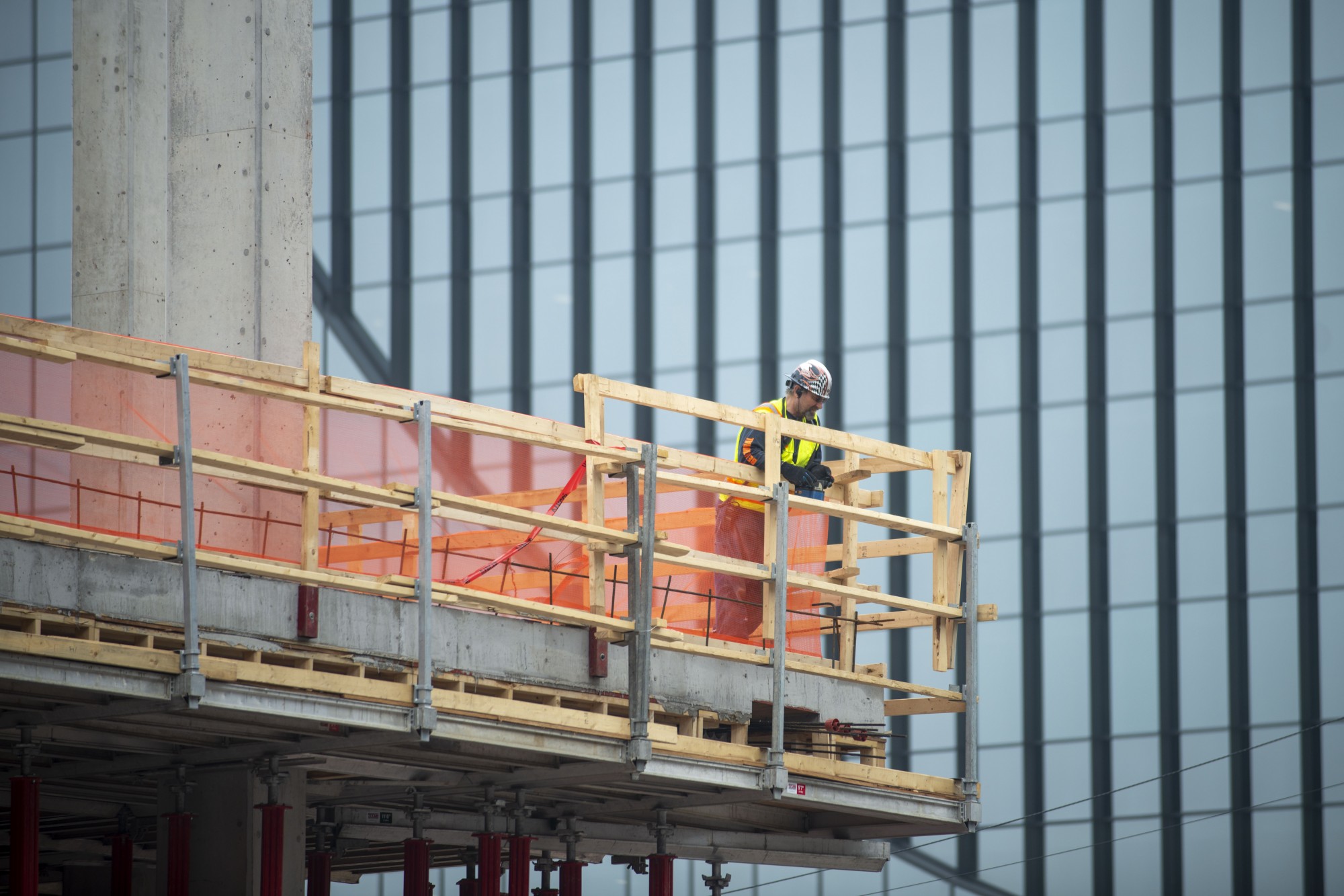 Construction is conducted in Minneapolis on Monday, April 6. Many developments could be put on hold as policymakers try to decrease COVID-19’s spread.