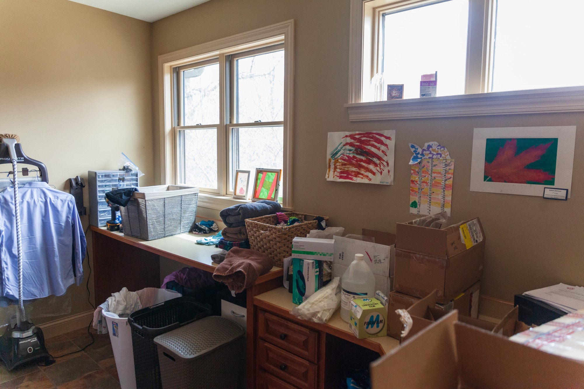 Components of a COVID-19 test kit sit among domestic goods in the home of Associate Professor Ryan Demmer on Friday, April 10.  The kit is being used to collect research data on the rate of asymptomatic infections among healthcare workers in the Twin Cities metro area.