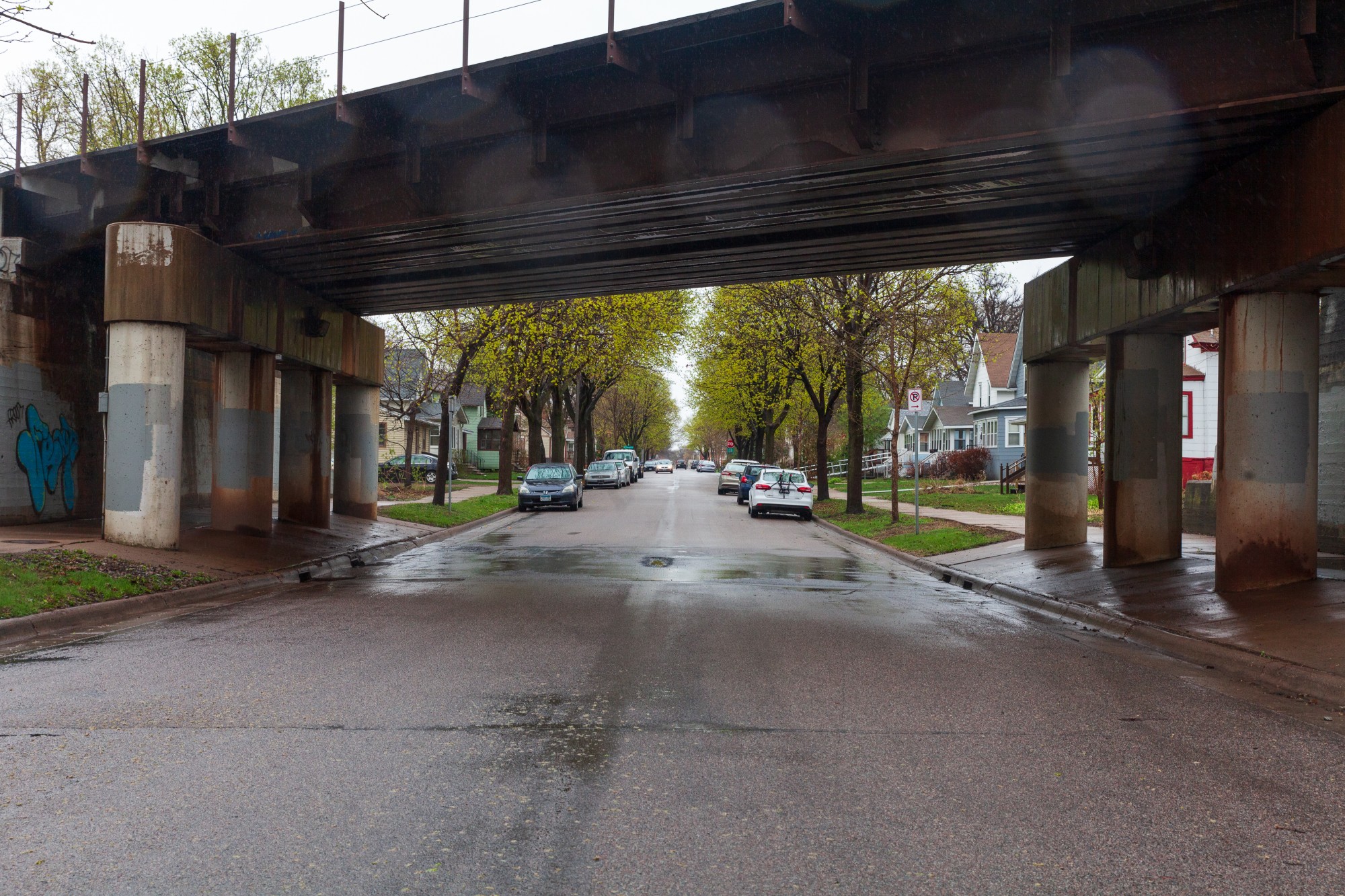 An overpass frames a residential street in the Como neighborhood on Tuesday, April 28.