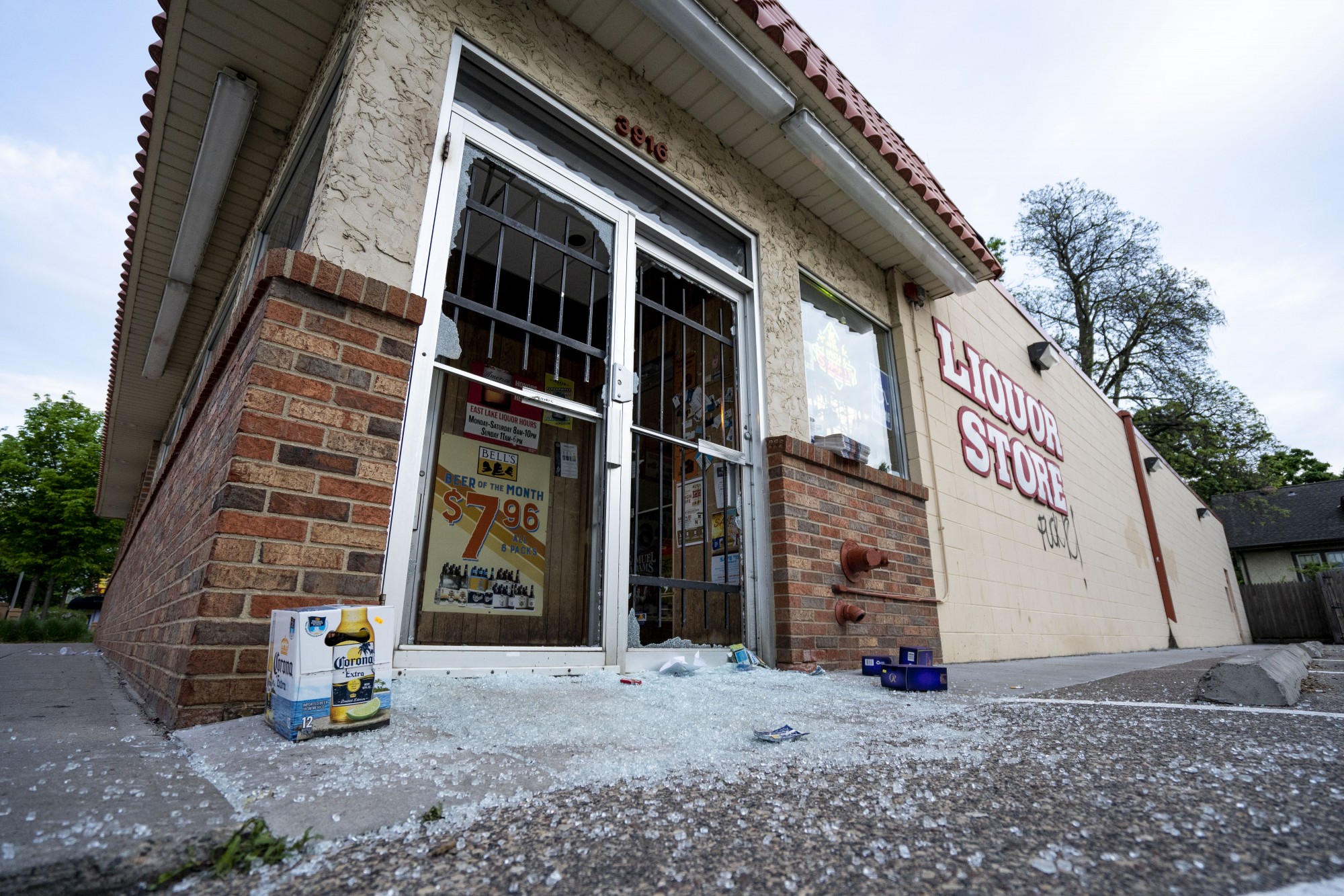 East Lake Liquor Store is seen the morning after a second night of protests that turned violent near the Minneapolis Police 3rd Precinct following the death of George Floyd. Dozens of businesses were vandalized and firefighters were still working to control several blazes still at hand on Thursday, May 28. 