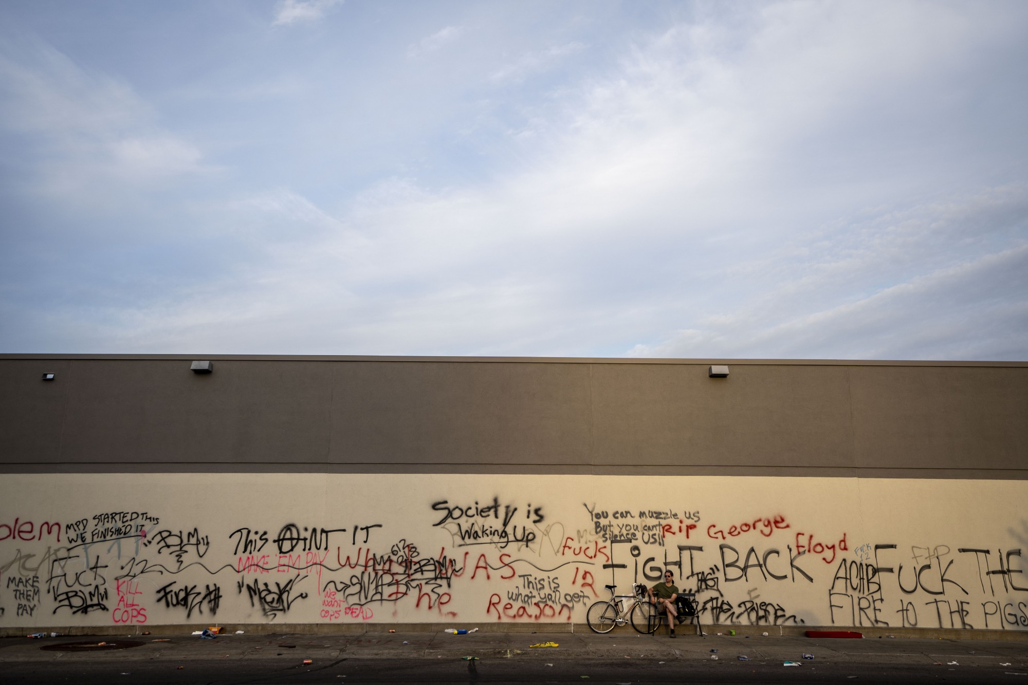 The walls of Target are seen covered in graffiti the morning after a second night of protests that turned violent near the Minneapolis Police 3rd Precinct following the death of George Floyd. Dozens of businesses were vandalized and firefighters were still working to control several blazes still at hand on Thursday, May 28. 