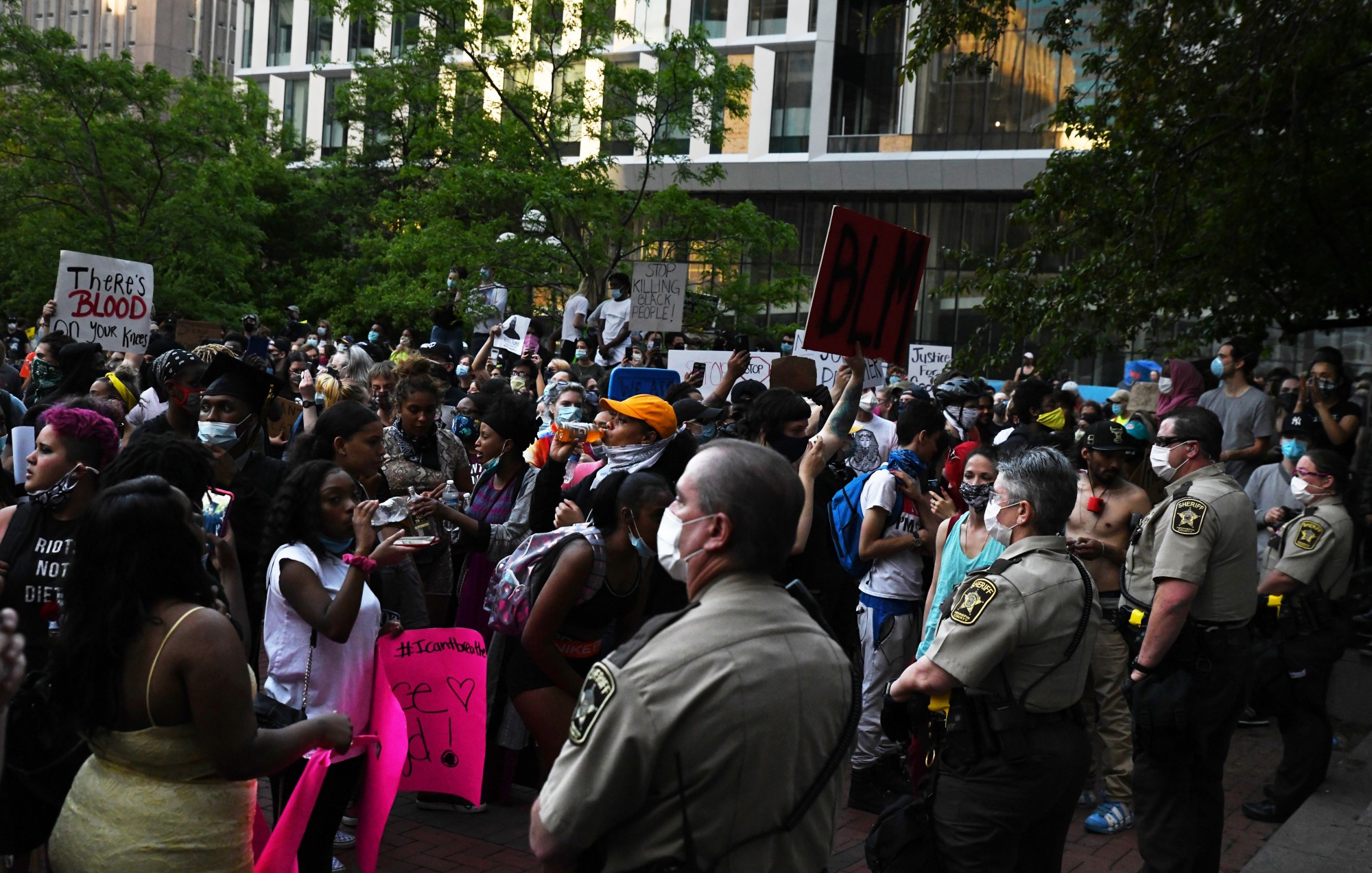 Hennepin County sheriffs face demonstrators in front of the Hennepin County Government Center in Minneapolis on Thursday, May 28. 