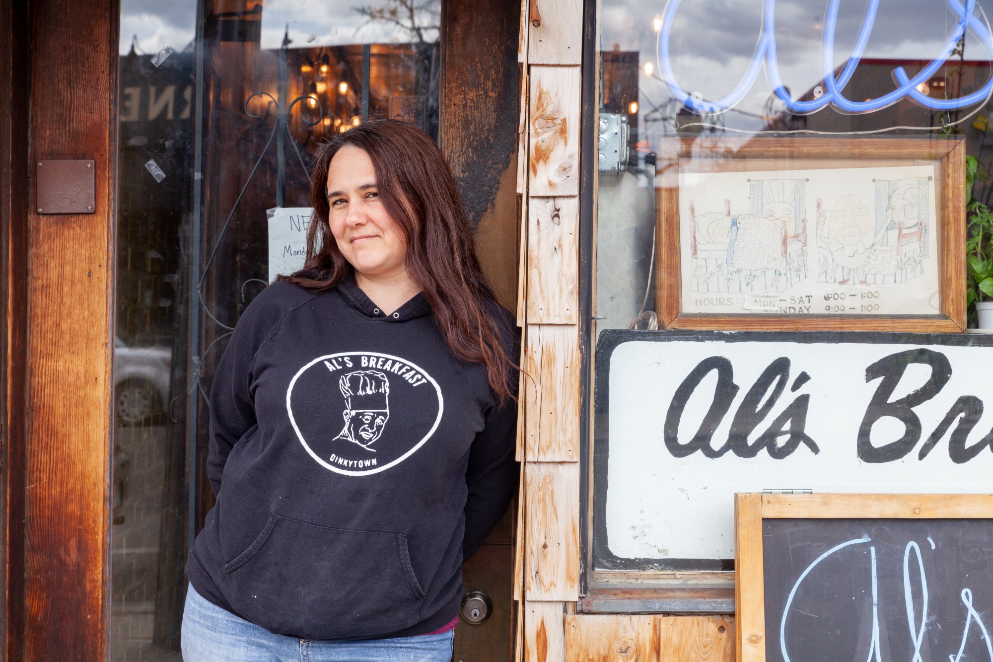 Als Breakfast Owner Alison Kirwin poses for a portrait outside of her business on Wednesday, May 6.
