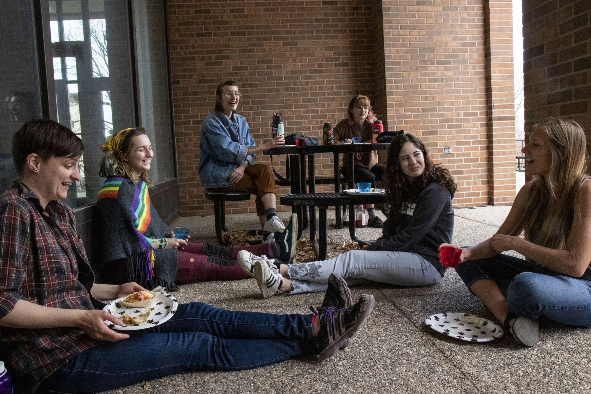 2:38 p.m.
Steph Grieb, left, throws a social distancing graduation party for her student animal senior care staff outside of the Biological Sciences Center on the St. Paul campus. 