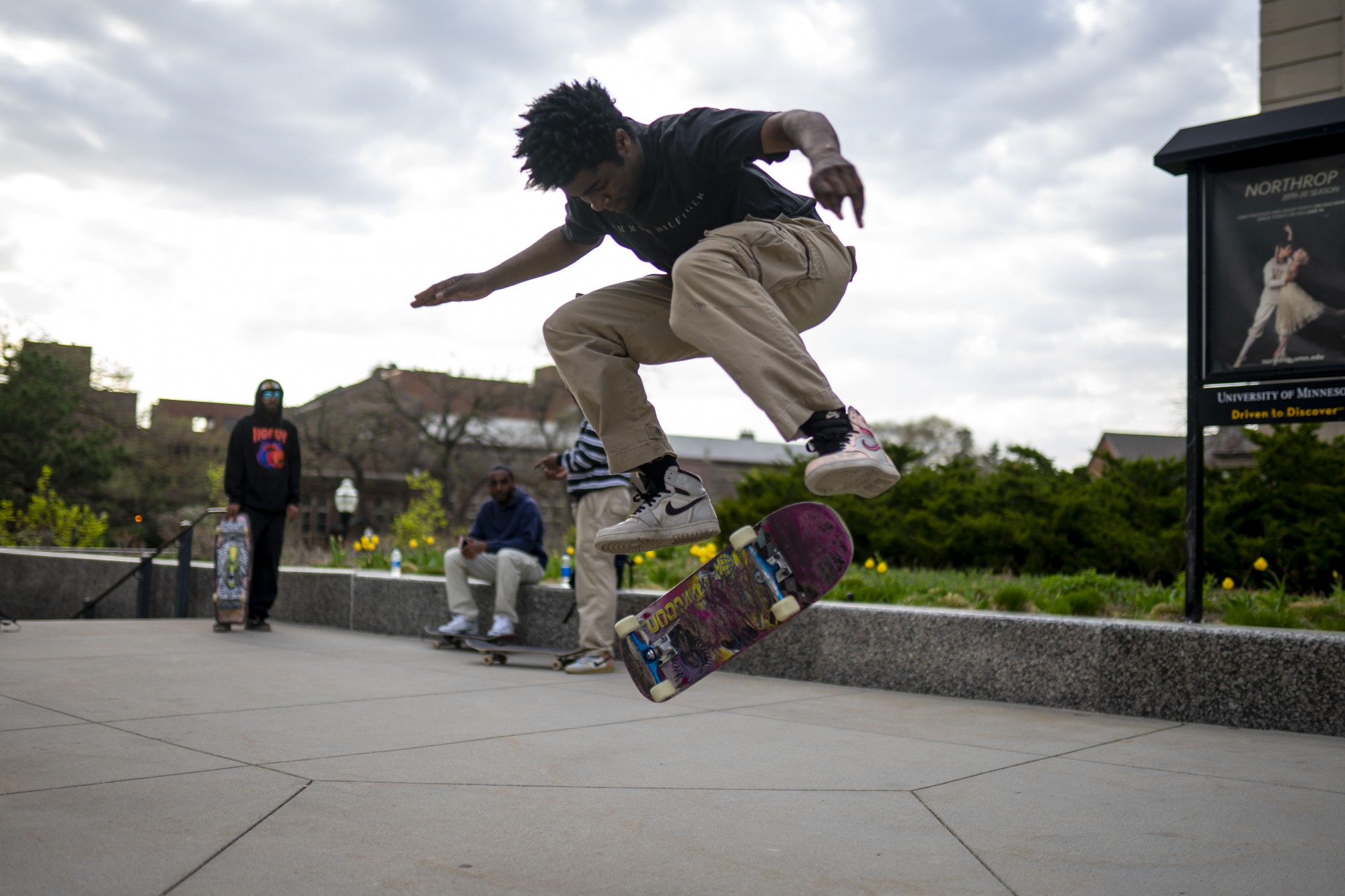 7:02 p.m.
Zack Wooten does a kick flip in front of Northrup Memorial Auditorium. Wooten and his friends took advantage of an empty campus to film a skate video. 