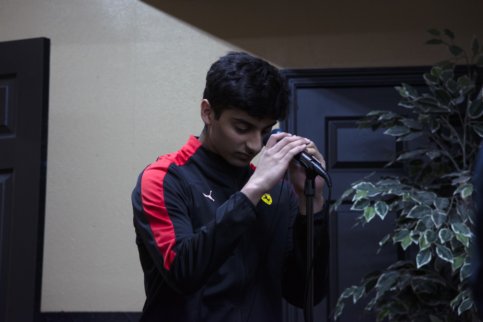 High school senior Ahmed Shahkhan takes a deep breath before he starts reciting Adhan to be broadcast to the neighborhood near Dar Al-Hijrah Mosque on Thursday, April 30. 