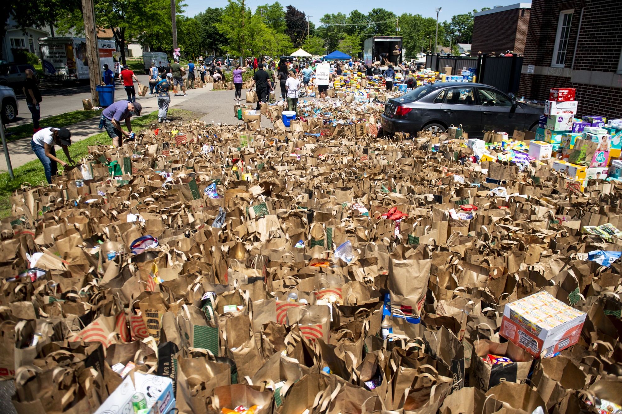 Donated goods are stockpiled and organized outside of Sanford Middle School in Minneapolis on Sunday, May 31. 




