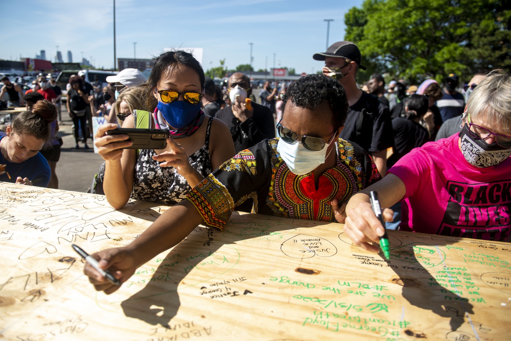 A stage was constructed near the intersection of East Lake Street and 26th Ave South for speakers to amplify their voices. Organizer Cornell Griffin had volunteers help complete the final steps. Those in attendance were also invited to sign their names as the finishing touches were added on Sunday, May 31. 