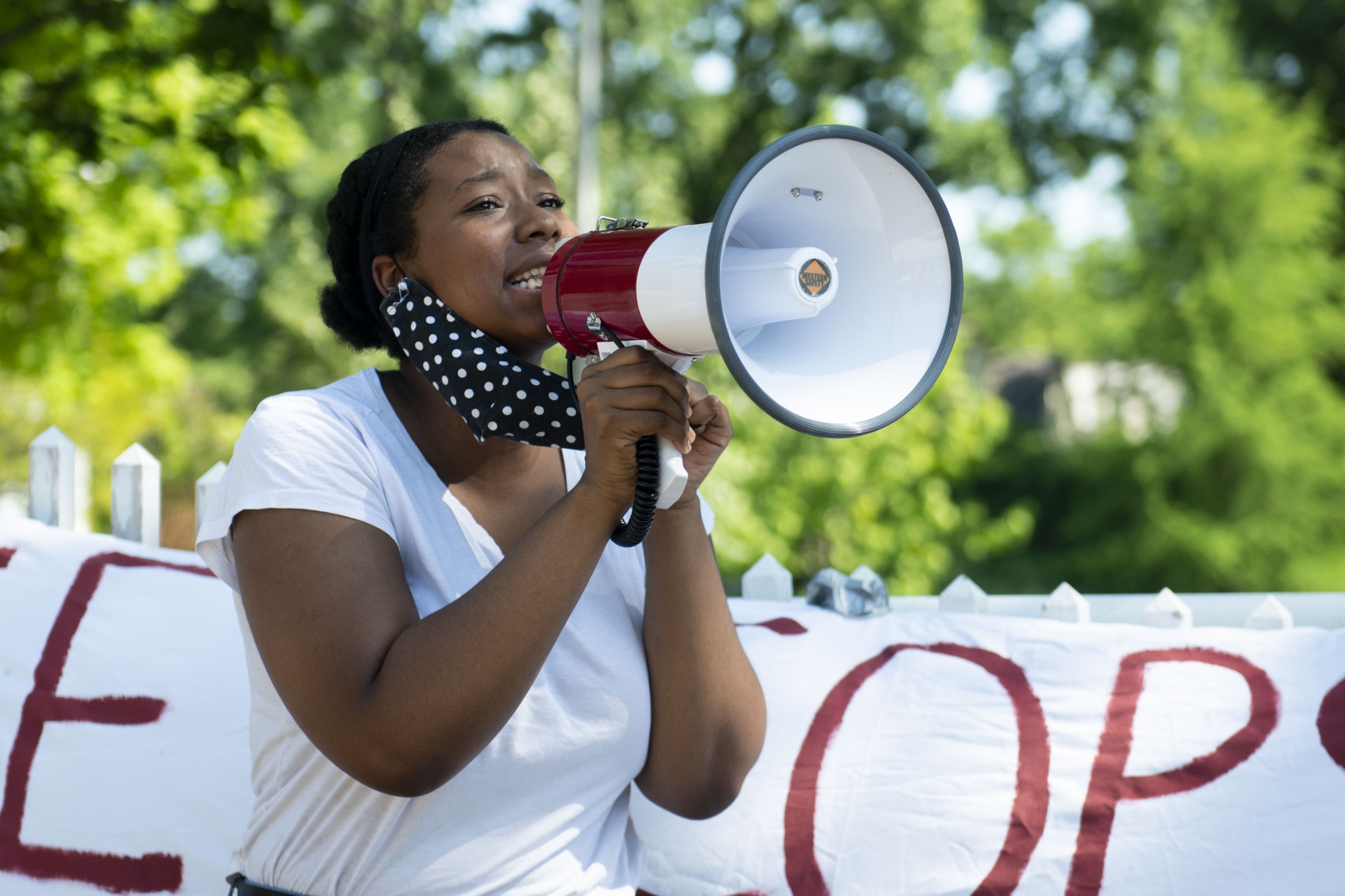 Fanta Diallo speaks to other demonstrators outside of Eastcliff, the residence of the University of Minnesotas President, on Monday, May 1. 




