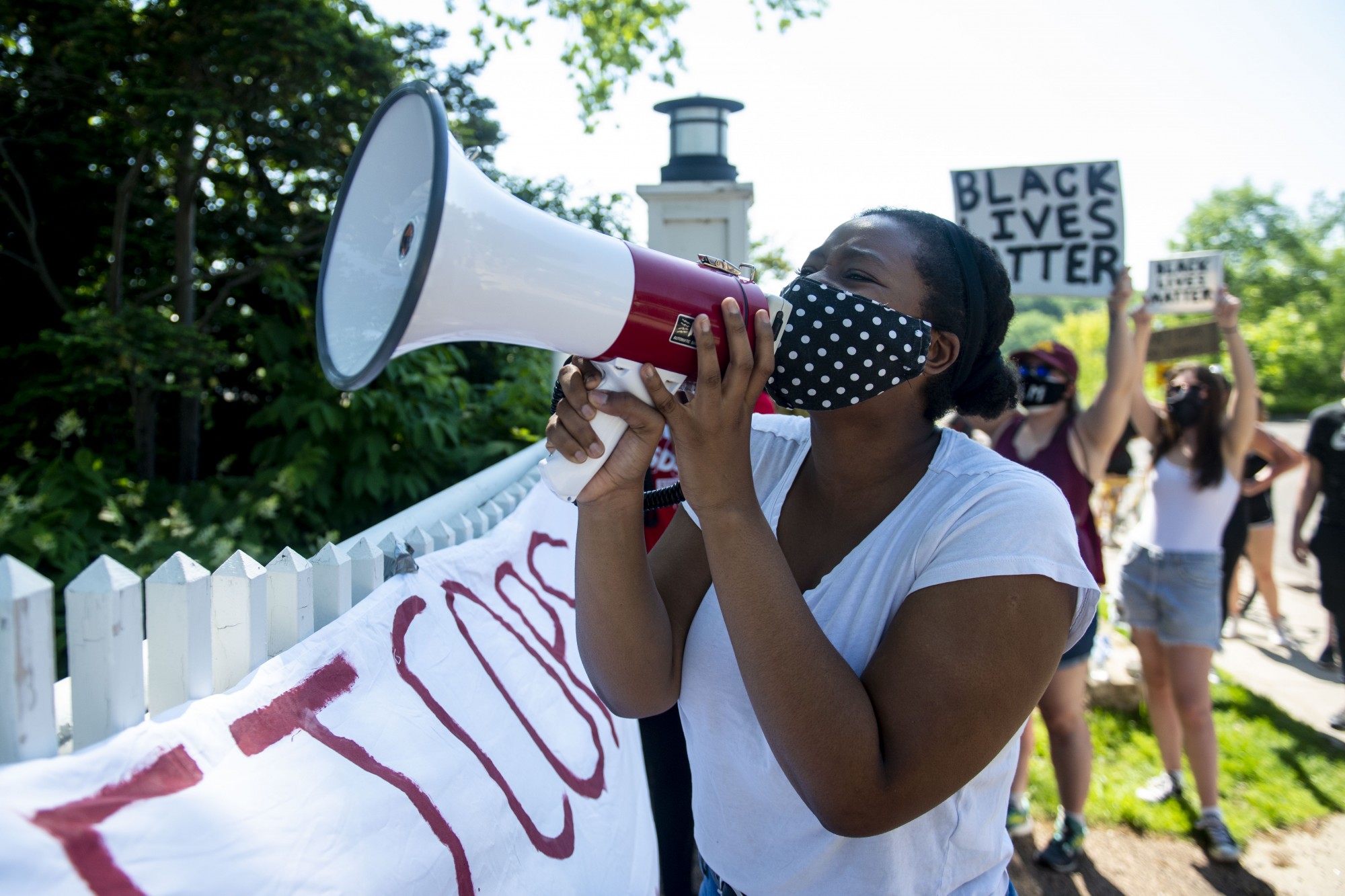 Fanta Diallo leads other demonstrators in chants outside of Eastcliff, the residence of the University of Minnesotas President, on Monday, May 1. 




