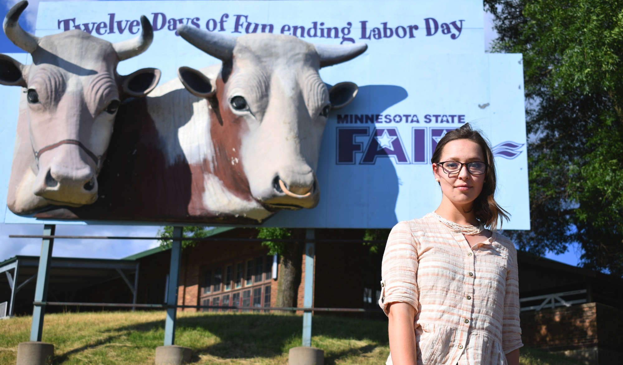 Agriculture communication major Elaine Dorn in the Minnesota State Fairgrounds on Wednesday, June 24. Dorn was planning to show her sheep at this year’s fair before it was canceled due to COVID-19.