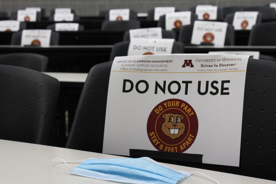 Social distancing signs flag down seats in Hanson lecture halls on Tuesday, July 28 at the University of Minnesota in Minneapolis. All classes during July-mester enforced social distance protocols.