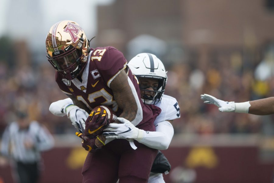 Wide+receiver+Rashod+Bateman+fights+to+hang+on+to+the+ball+at+TCF+Bank+Stadium+on+Saturday%2C+Nov.+9.+The+Gophers+bested+the+Penn+State+Nittany+Lions+31-26+to+remain+undefeated.+