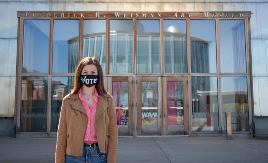 Sophomore Rose Lloyd-Slifkin, who studies political science and gender, women and sexuality studies, poses in front of the Weisman Art Museum on Thursday, Sept. 24. The Weisman is one of the voting locations available to students who are living on campus in dorms.