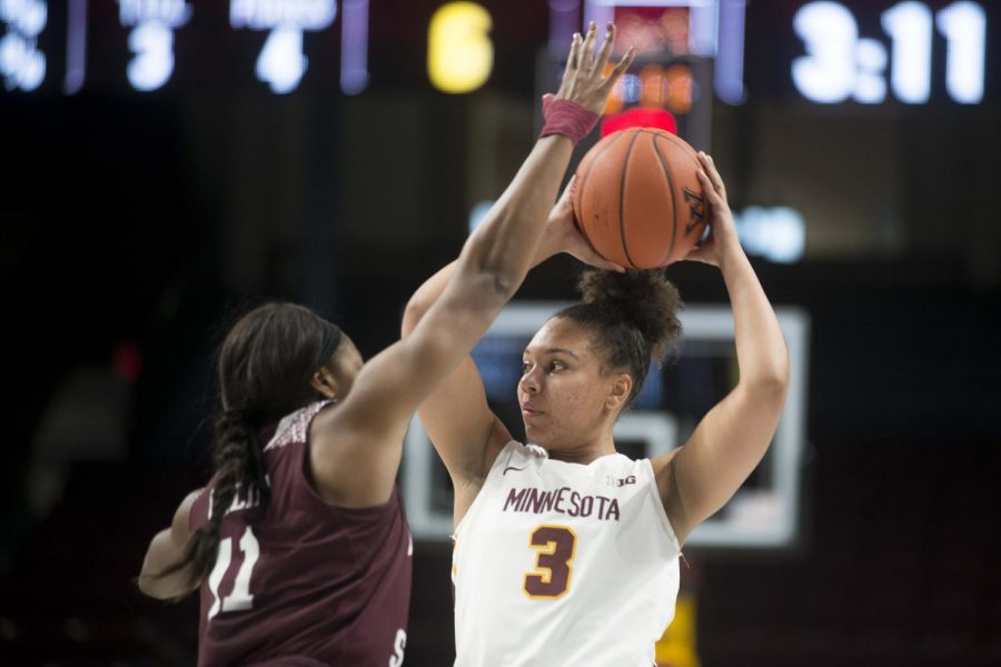 Forward Destiny Pitts looks to pass the ball through a defender at Williams Arena on Tuesday, Nov. 5, 2019. The Gophers fell to Missouri State 69-77.