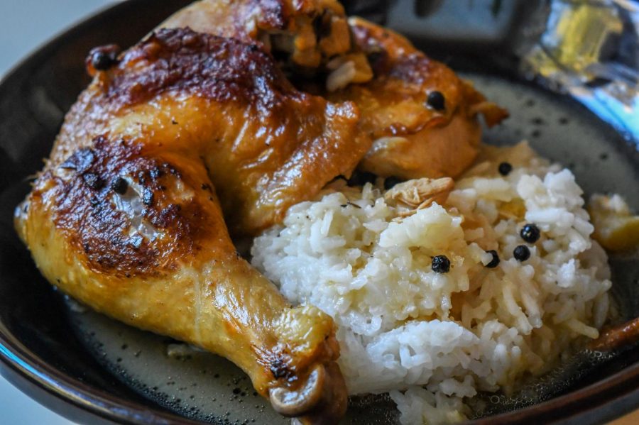 A plate of chicken adobo, a Filipino dish, cooked for the Sharing Food series on Saturday, Oct. 10. Chicken adobo is prepared with soy sauce, vinegar, garlic, and black pepper and is typically served with rice.