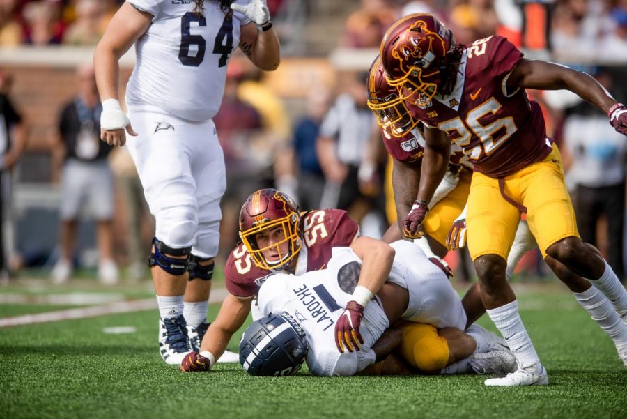 Gophers linebacker Mariano Sori-Marin makes a tackle on Thursday, Sept. 12, 2019.