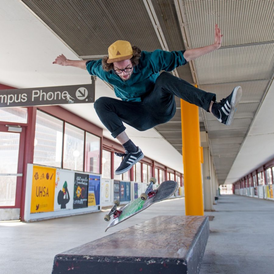 Jonathan MacDonald perfects his skate tricks on the Washington Avenue bridge.