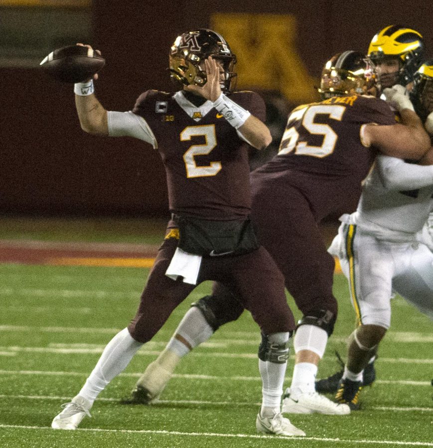 Gophers quarterback Tanner Morgan prepares to launch a pass at TCF Bank Stadium on Saturday, Oct. 24. Minnesota fell to Michigan 49-24 in their first showing of the season.
