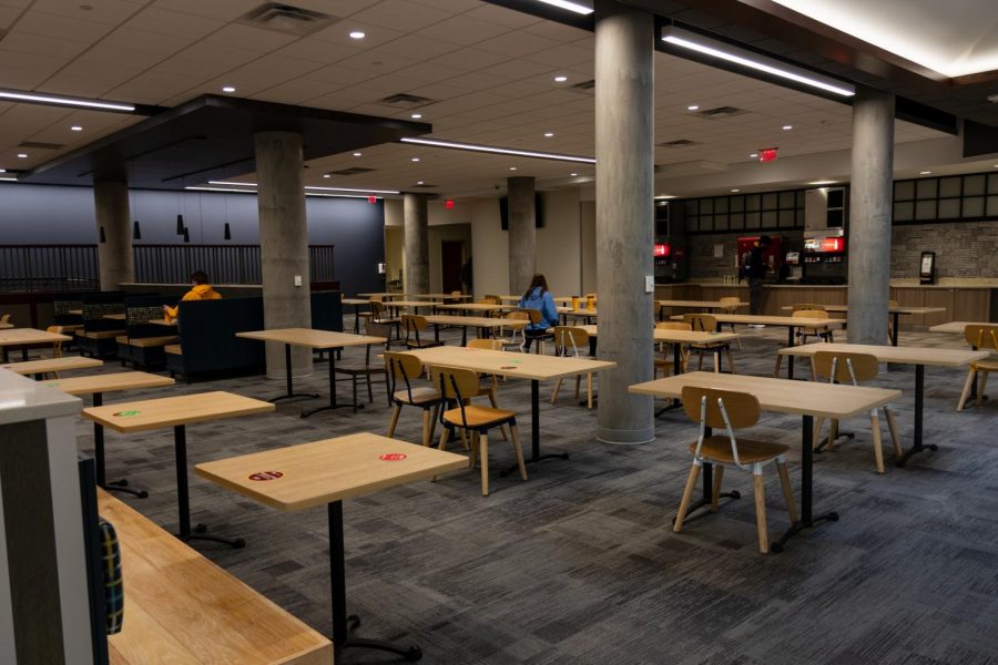 A variety of public health procedures, including designated clean and dirty tables, unidirectional routes, and socially-distanced seating protect students dining in Pioneer Hall on Monday, Nov. 2.