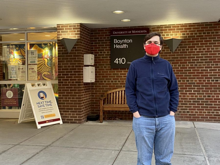 Second-year University student John Walczak poses for a portrait outside of Boynton Health on the Twin Cities campus. After Thanksgiving, Walczak is planning on staying home with his family for the rest of fall semester.