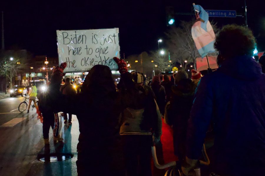 Demonstrators march down East Lake Street in response to the Presidential Inauguration on Wednesday, Jan. 20. The protest lasted around two hours.
