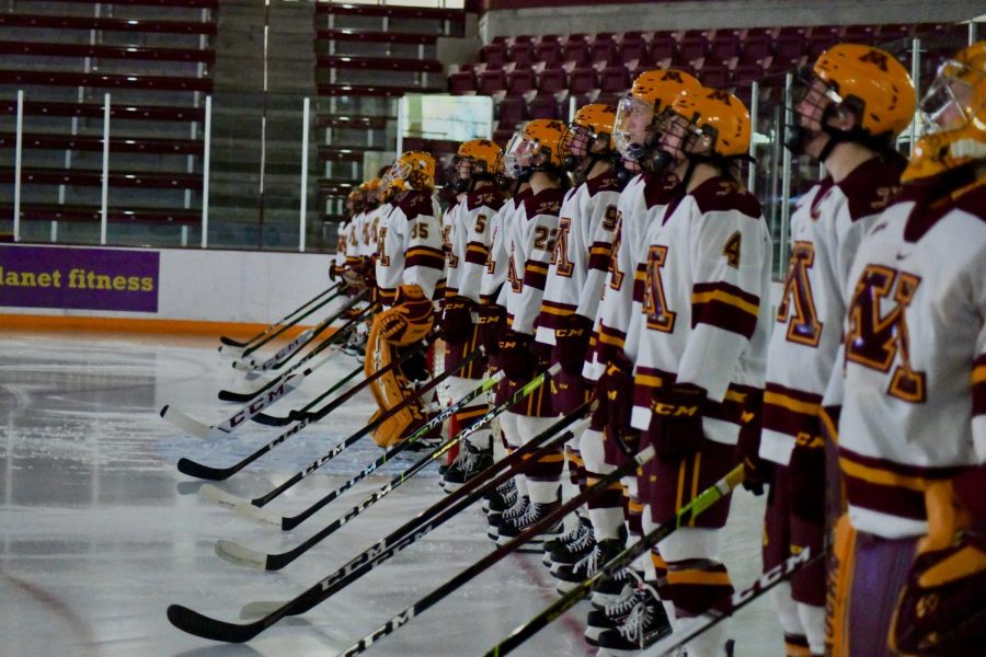 University of Minnesota women’s hockey team lines up before their game against Ohio State in Ridder Arena on Saturday, Nov. 21. The Gophers won in a shut out with an ending score of 4-0.
