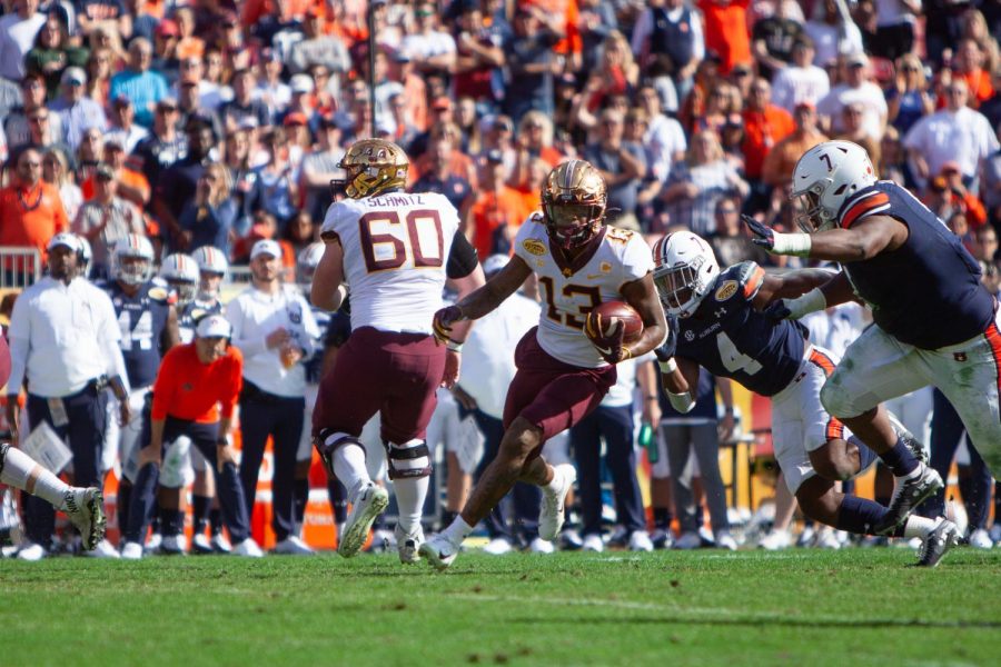 Gophers Wide Receiver Rashod Bateman carries the ball at the 2020 Outback Bowl on Wednesday, Jan. 1.  The Gophers went on to take the game 31-24 over the Auburn Tigers.