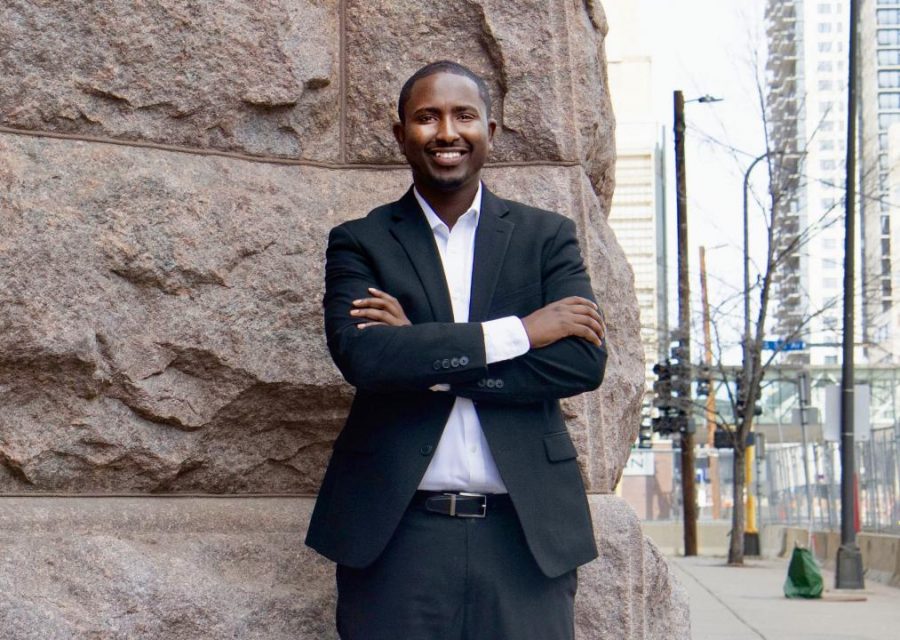 Minneapolis Mayoral Candidate AJ Awed poses in front of Minneapolis City Hall on Sunday, April 18.