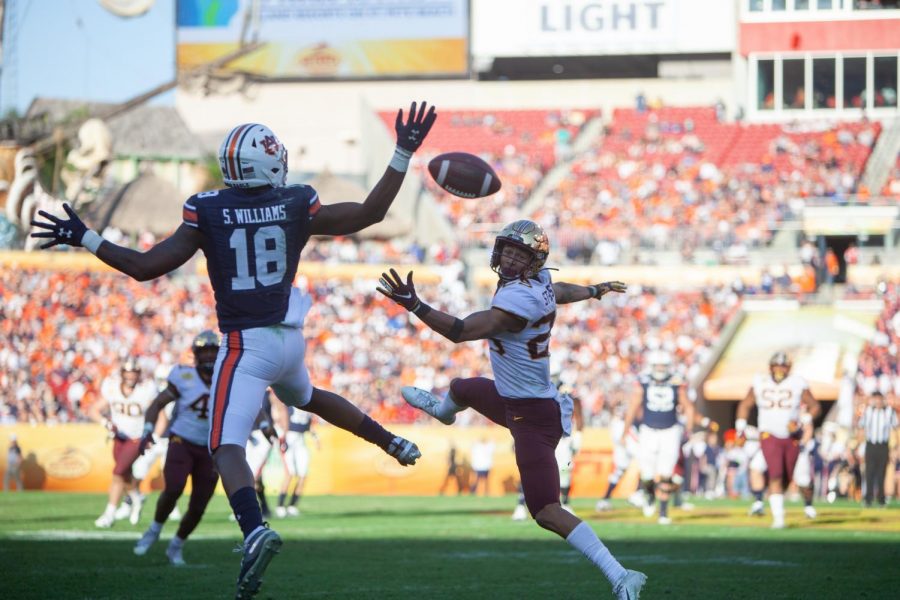 Gophers Defensiveback Benjamin St-Juste leaps for an Auburn pass at Raymond James Stadium in Tampa, Florida on Wednesday, Jan. 1, 2021 Minnesota took the bowl game with a 31-24 win over the Auburn Tigers. The Gophers will play in their next bowl game in New York on Dec. 29.