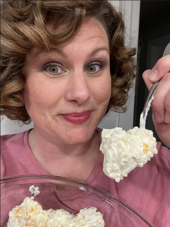 Amber Schwarzrock, known as @ThatMidwesternMom on the popular social media app TikTok, shows off her famous Pineapple Cottage Cheese Fluff Surprise salad made with lemon Jell-O, cottage cheese, Chool Whip, pineapple and mandarin oranges. Photo courtesy of Schwarzrock.