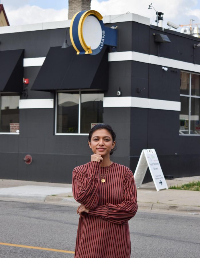 Owner of Saba Dhaba Do poses outside of the Curie Food Hall. The Currie Food Hall has a variety of restaurants to chose from, including two that are run by Saba.
