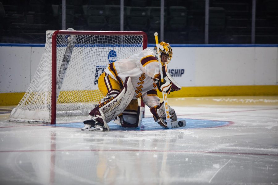 Goalie Jack LaFontaine blocks a shot from going into the goal at the Budweiser Events Center against the Minnesota State Mavericks. The Gophers lost at the Loveland Regional final, 4-0.