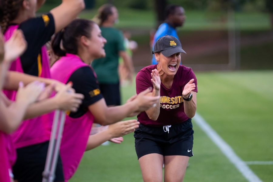 Gophers+head+coach+Erin+Chastain+celebrates+her+first+win+with+the+program+in+their+first+match+of+the+season+against+Baylor+on+Thursday%2C+Aug.+19%2C+2021%2C+at+Elizabeth+Lyle+Robbie+Stadium.