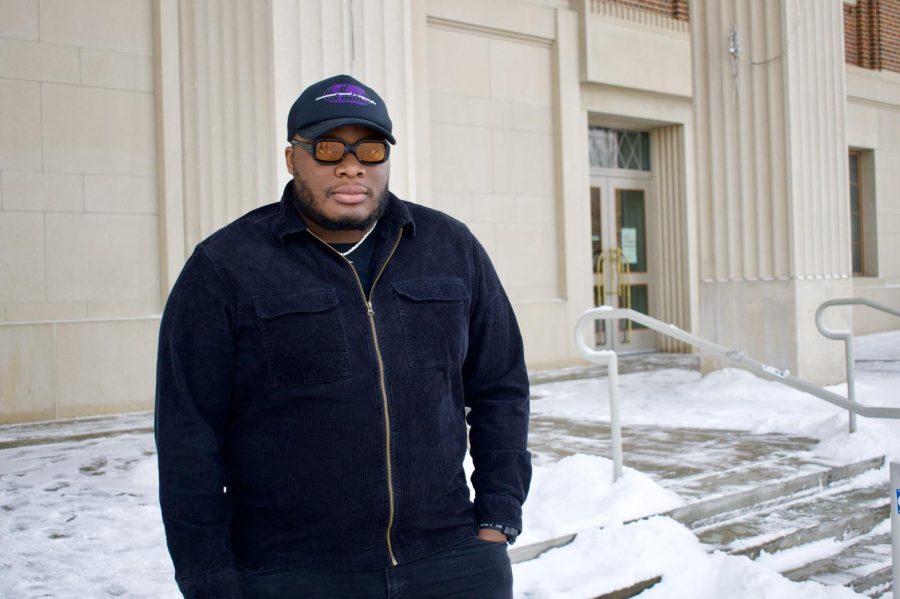 Photographer Mark Khan poses for a portrait in front of Coffman Memorial Union on Sunday, Jan. 23. Khans photo exhibit, which emphasizes placing Black bodies in celestial spaces, will be open in Coffman Memorial Union from Feb. 3 through March 20.