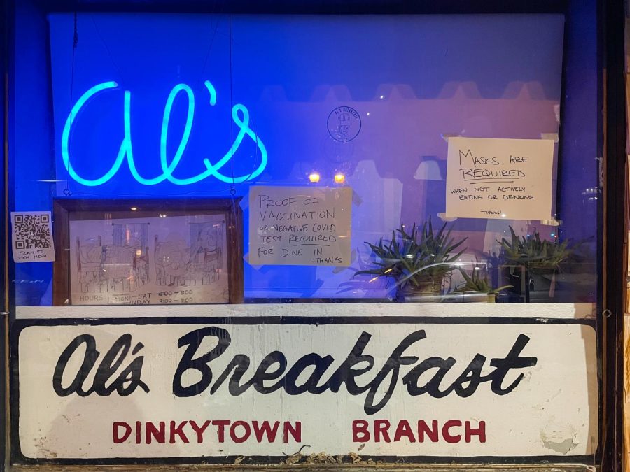 Als Breakfast in Dinkytown Minneapolis displays a sign asking customers to show proof of vaccination or a negative COVID test in order to dine in. This is a result of the new mandate in Minneapolis for bars and restaurants.