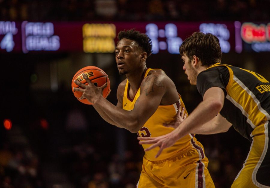 Senior Charlie Daniels looks to make a pass Against the Iowa Hawkeyes on Jan. 16, 2022 at Williams Arena in Minneapolis, Minn. 